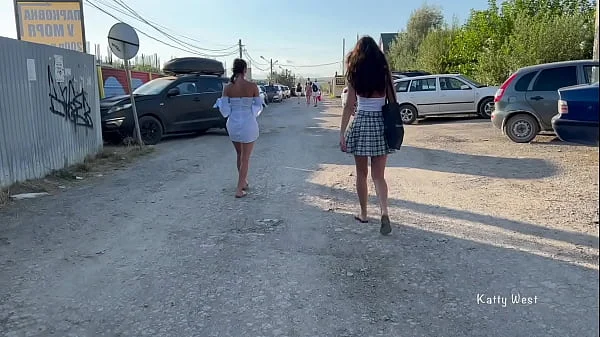 Two girls walk in public without panties and show pussies